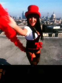 Me featured dancing on the roof top in the opening scene of 